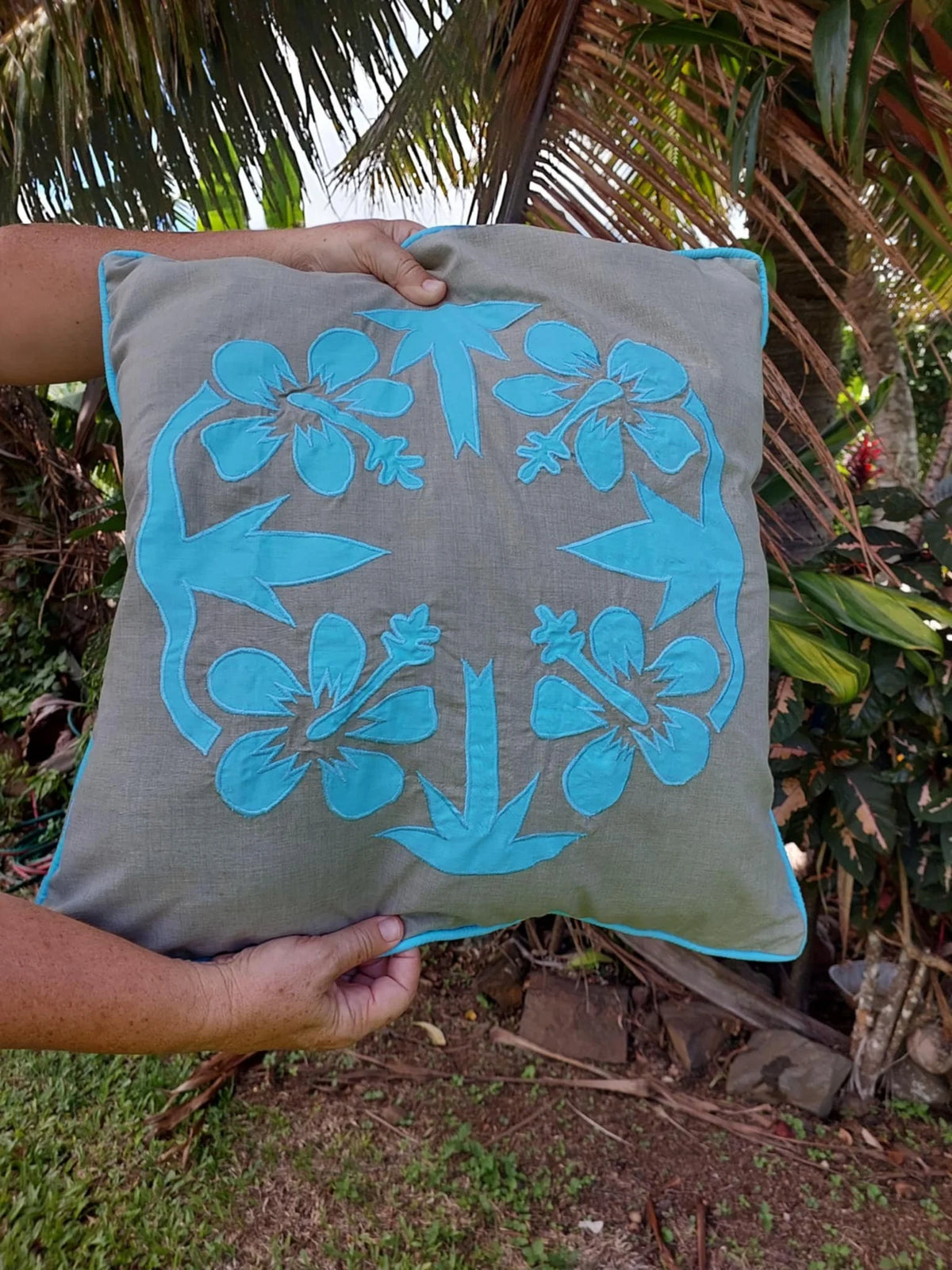 'Nikao' design Hibiscus Cushion Covers taupe with tosca
